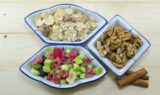 Muesli, walnuts and dried fruit on a table